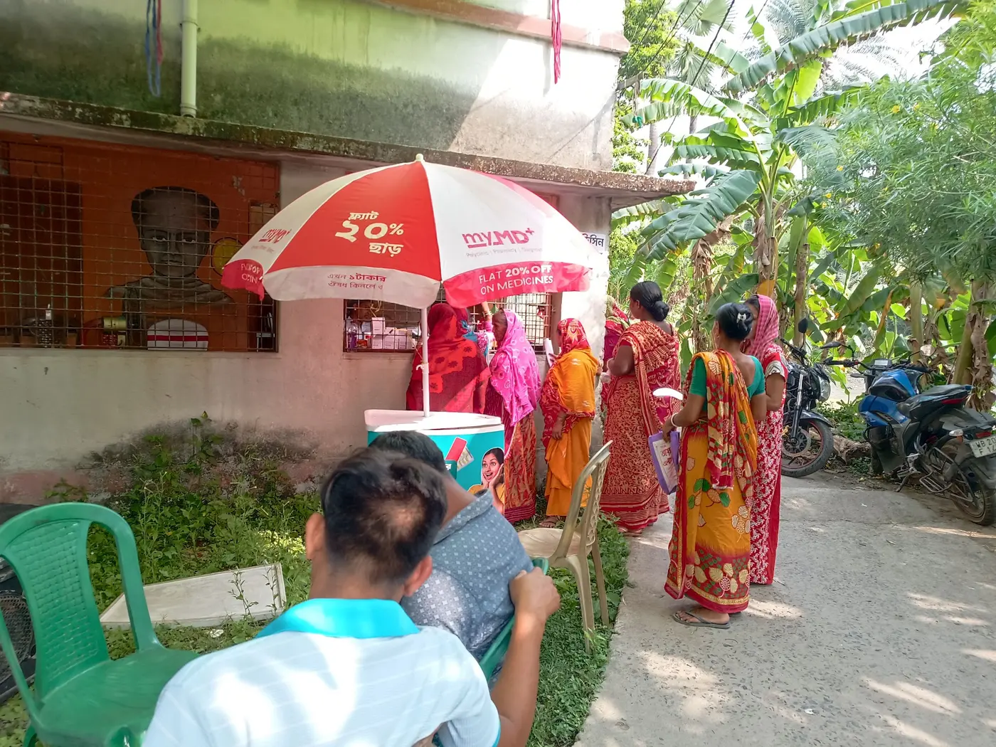 Villagers queuing at the discounted medicine counter at a BDAF rural camp